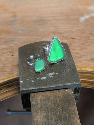 Examples of handmade sea glass rings made in silver jewellery making workshop