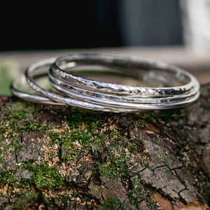 Examples of silver bangles made by students in silver bangle making jewellery workshop