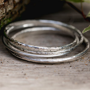 Examples of silver bangles made by students in silver bangle making jewellery workshop