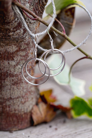 An example of a handcrafted silver drop earrings made in silver jewellery making workshop