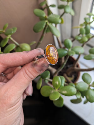 Example of handcrafted silver and amber stone ring made in jewellery making workshop