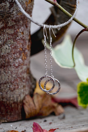 An example of a handcrafted silver drop earrings made in silver jewellery making workshop