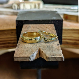 Examples of handmade gold wedding bands made in private jewellery making workshop