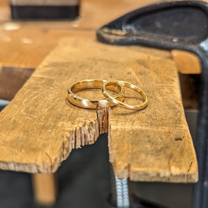 Examples of handmade gold wedding bands made in private jewellery making workshop