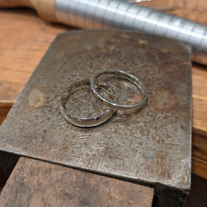 Examples of handmade silver engraved wedding bands made in private jewellery making workshop