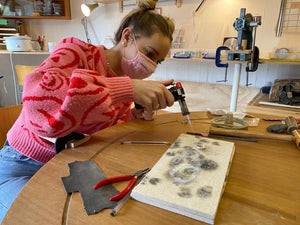 Bride uses blowtorch on handmade wedding band