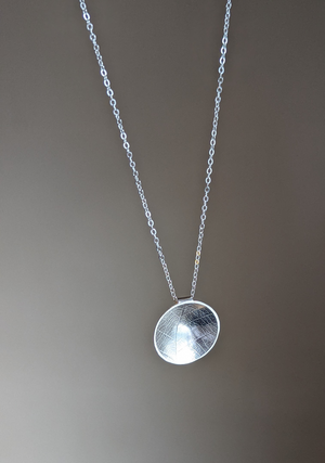 Example of handcrafted silver necklace made in jewellery making workshop