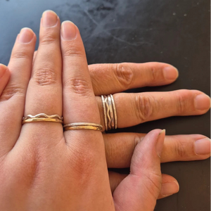 Collection of stacking rings hand crafted in silver and copper in jewellery making class Cardiff