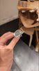 Student shows handcrafted silver hedgehog brooch made in jewellery making workshop
