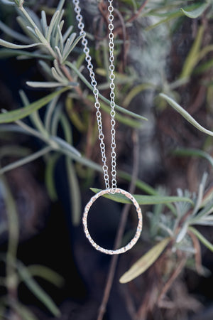 An example of a handcrafted silver necklace made in silver jewellery making workshop