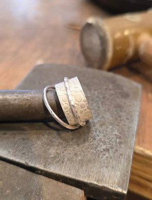 Handmade silver fidget spinner ring in process jewellery making workshop course