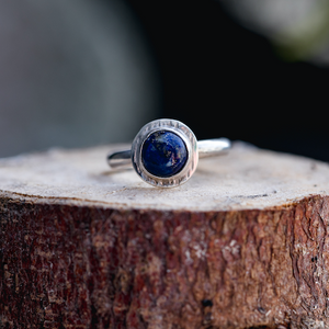 Examples of carbon stone ring made by students in silver making jewellery workshop