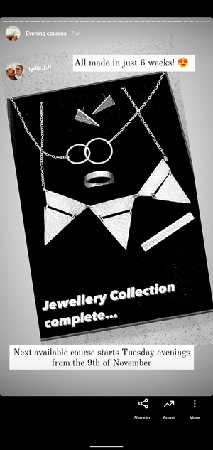 Student shows hand made silver necklaces and rings made at jewellery making workshop
