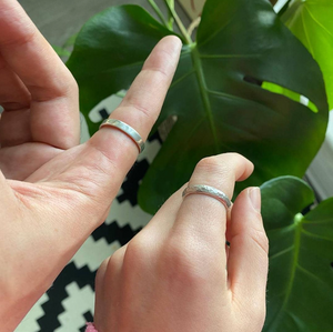 Students wear handcrafted silver rings made in jewellery making workshop